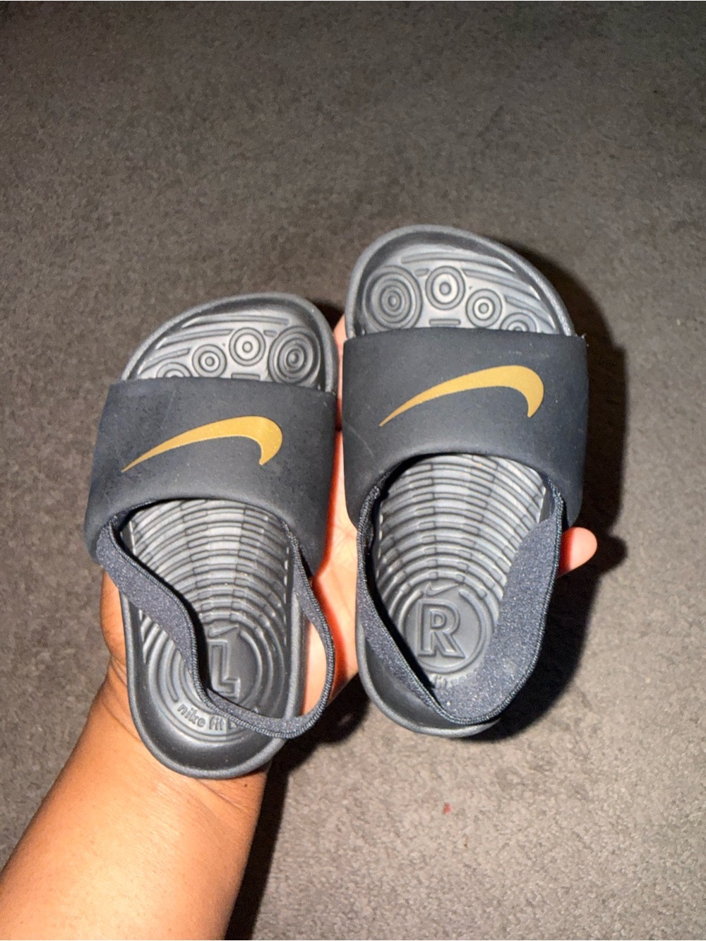 Nike Youth Black Slides with Gold Swoosh